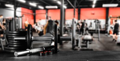 Gym,Interior,Background,And,Dumbbells,Decoration.,Free,Space,For,Your